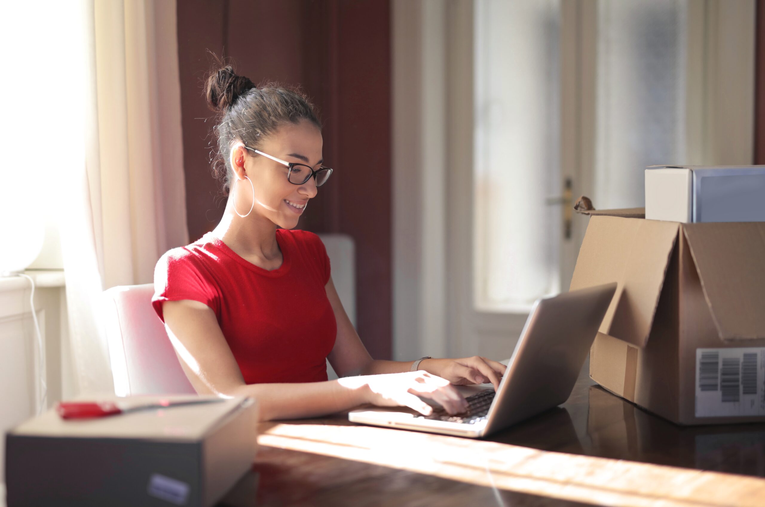 young-woman-home-uses-computer