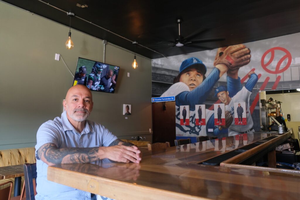 Why this LA business owner is painting over his Dodgers mural