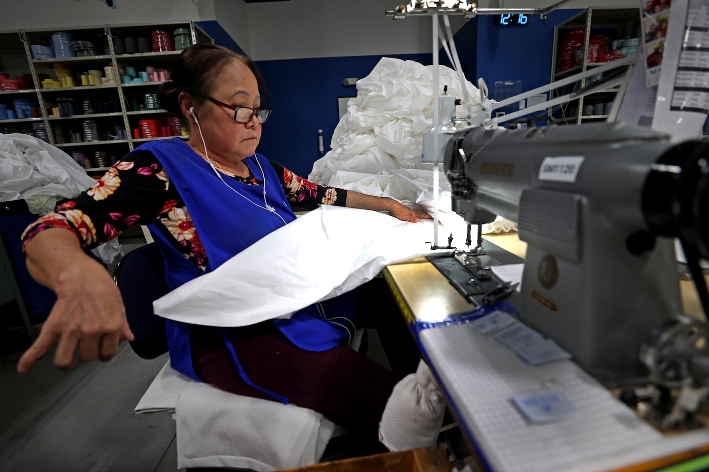 Employee Kim Im sewed fitted sheets on the factory floor at the Matouk factory in April.