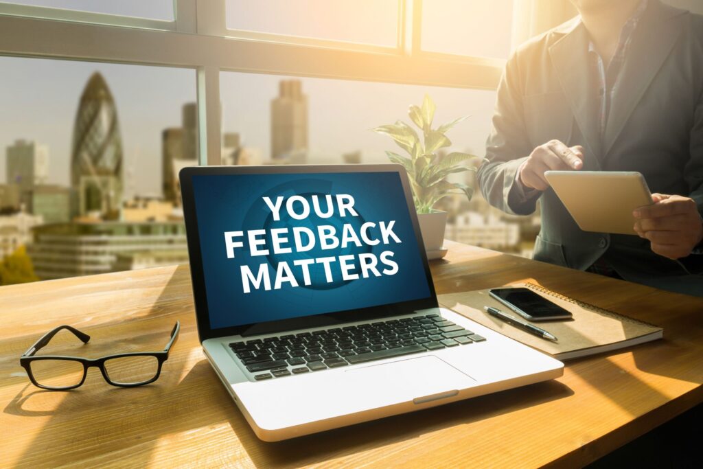 Laptop with survey on a desk that says "Your Feedback Matters."