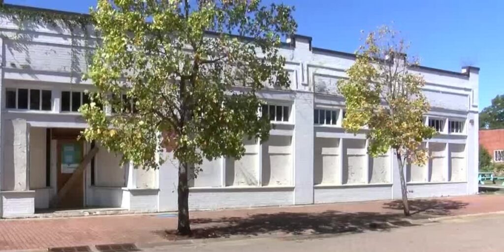 Local business owner struggles for years to purchase building on historic street