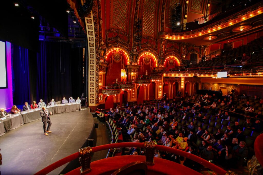 Rishi Shukla of the Downtown Boston Neighborhood Association moderated a discussion on public safety in the area. The summit was held at the Cutler Majestic Theatre on Thursday.