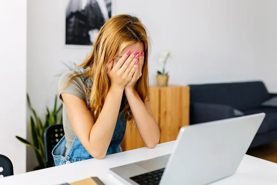 Getty Stock photo of a stressed woman on her laptop