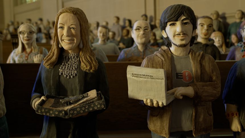 Dozens of three-foot-tall statues of Internet Archive staff populate the former church's main sanctuary.
