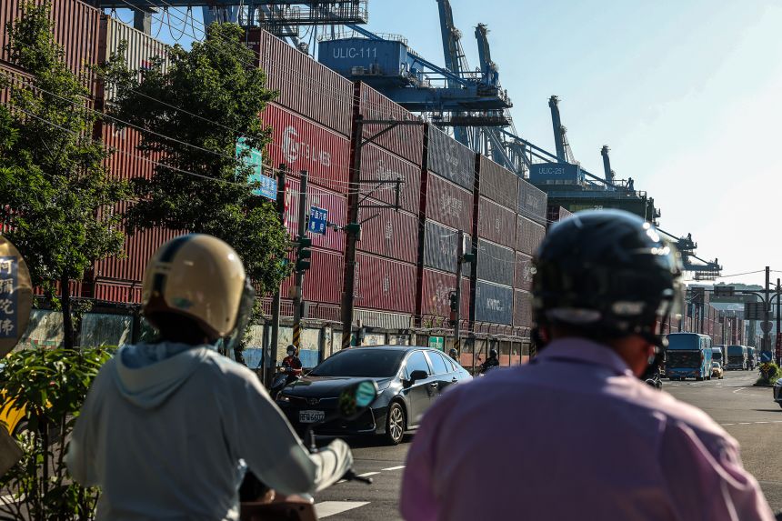 Shipping containers are seen at the Port of Keelung, Taiwan, on August 7, 2025.
