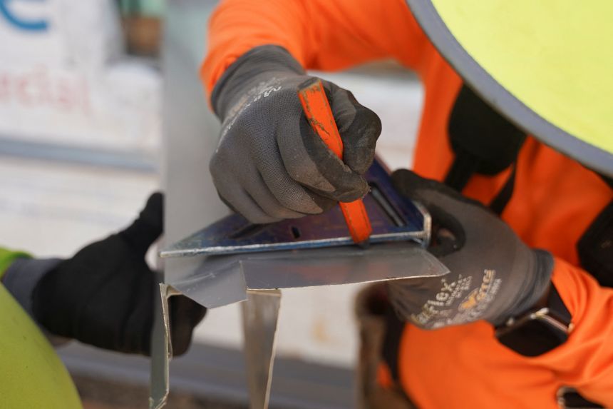 People work at a construction site facing shortages of migrant workers due to the pace of immigration-related raids in the region, near Mobile, Alabama, on July 14, 2025.