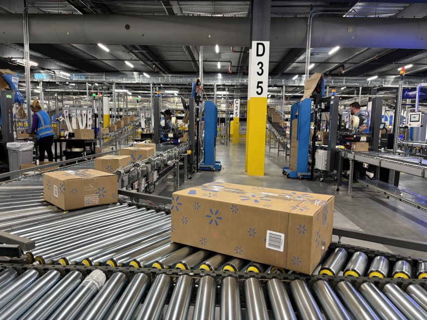AI-powered machines make custom boxes for each order, sort the product and tapes the box shut at Walmart's Greencastle fulfillment facility.