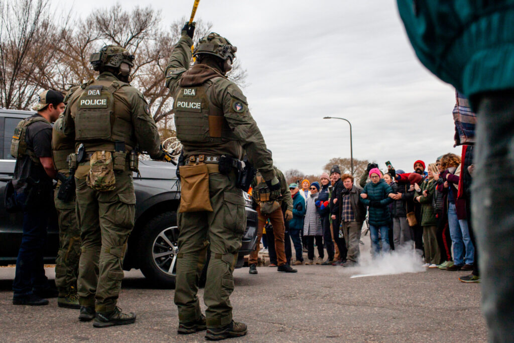 Dozens of federal agents raid St. Paul business, sparking protest