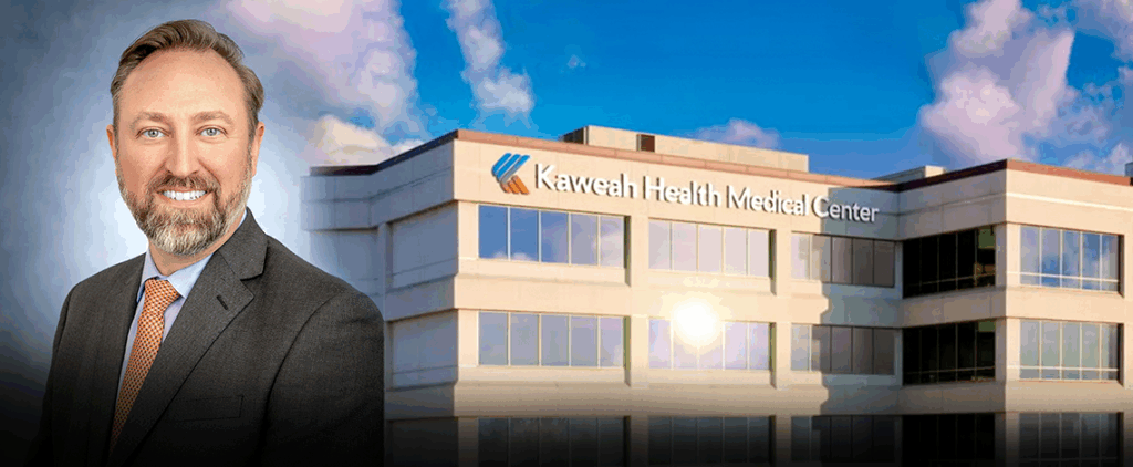 a man's portrait combined with a hospital building