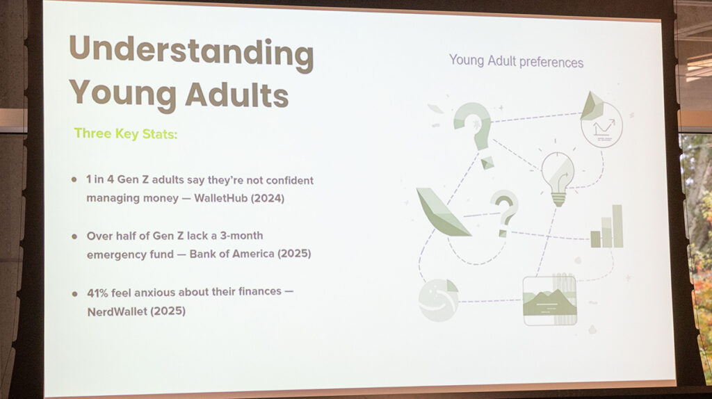 A PowerPoint slide is projected onto a screen.