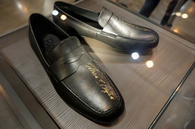 Shoes autographed by Berkshire Hathaway CEO Warren Buffett are seen in a raffle at the shareholder shopping day as part of the Berkshire Hathaway annual meeting in Omaha on May 5, 2017.