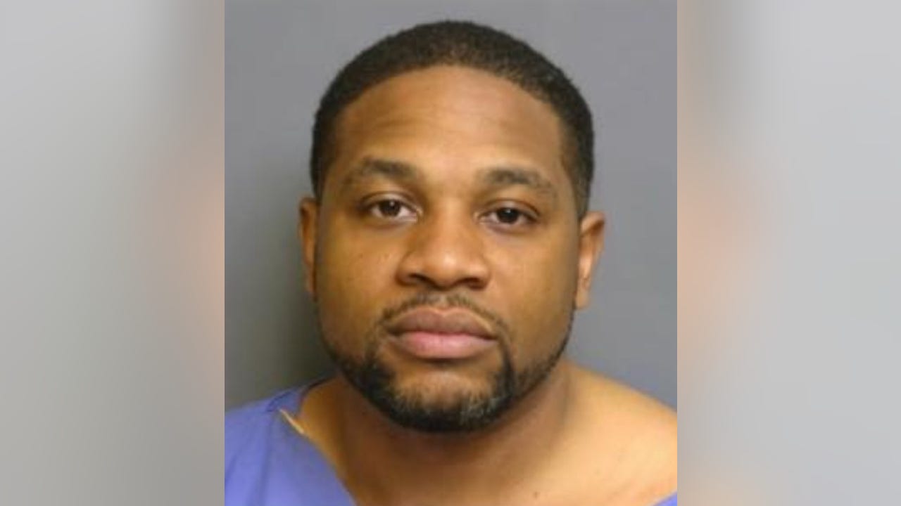 Man accused of robbing customers, employees at gunpoint inside Eastpointe business