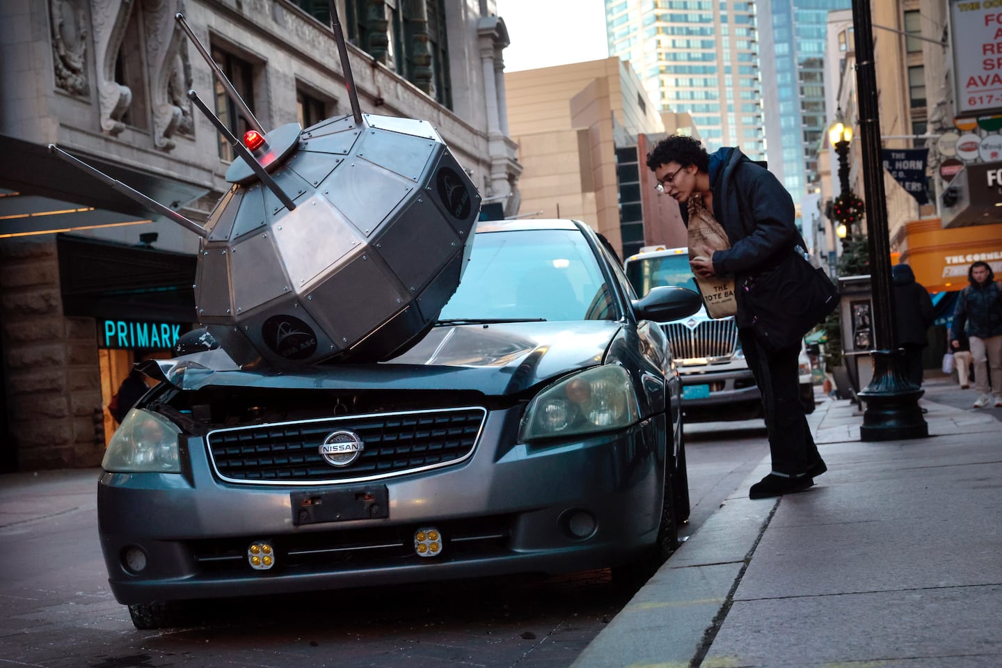 A pedestrian took interest in an art installation titled “Alouette” in Downtown Crossing on Jan. 10.
