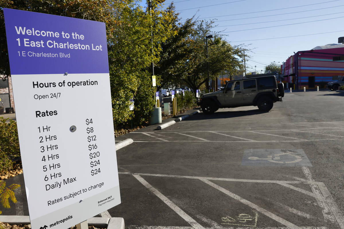 Parking fees are posted at 1 East Charleston Blvd. parking lot on Friday, Dec. 12, 2025, in Las ...