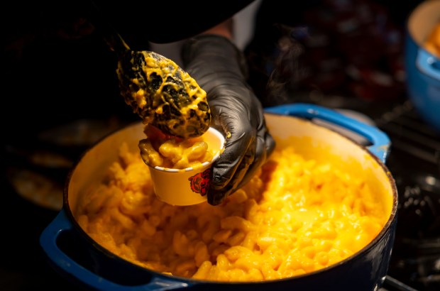 Molly's mac and cheese with cavatappi, cheddar and American cheese is prepared on Sept. 4, 2025, as the Chicago Bears showcase food offerings at Soldier Field. (Brian Cassella/Chicago Tribune)
