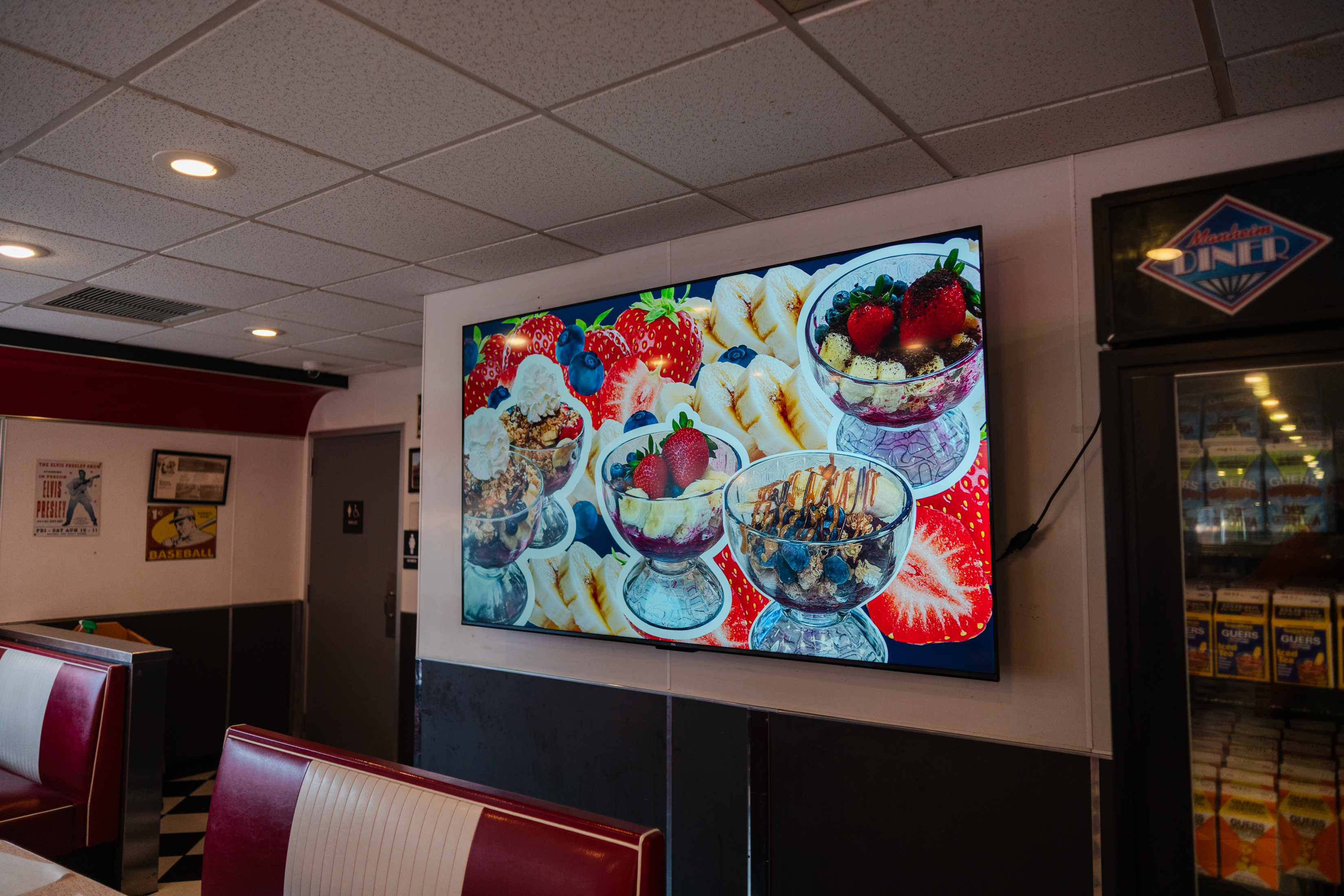 A screen shows acai bowls at the Manheim Diner in...