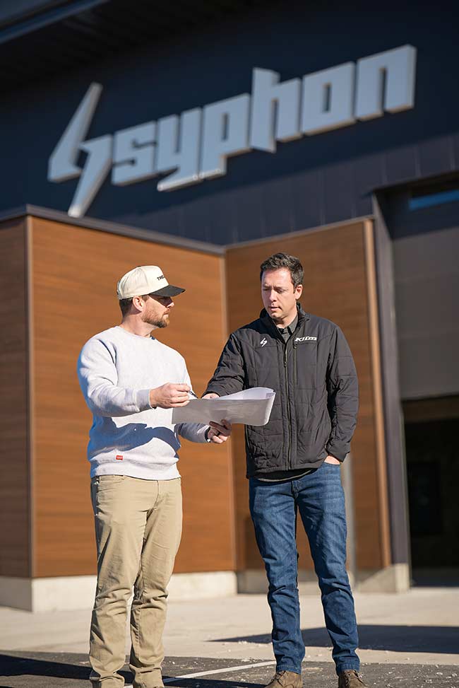 Two Syphon Sound employees, one of which is CEO Kyle Rawson | Courtesy Andrew Heiner
