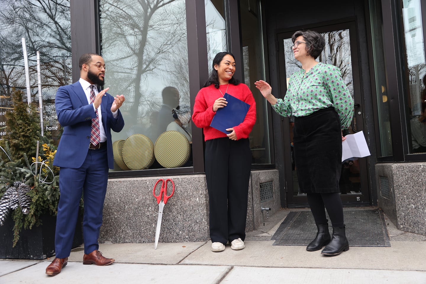 Segun Idowu talks with restaurant owner Maya Mukhopadhaya in Jamaica Plain last year.
