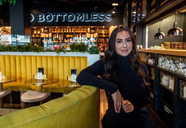 Owner Gina Luari of The Place 2 Be at the restaurant's West Hartford location in November. (Aaron Flaum/Hartford Courant)