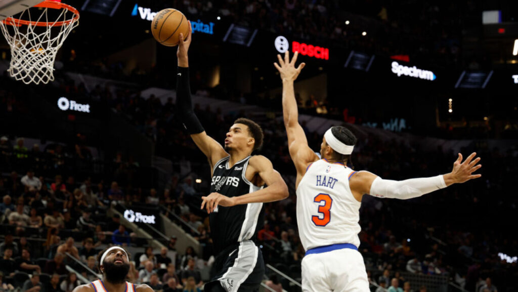 How to watch NBA Cup 2025 online, livestream San Antonio Spurs vs. New York Knicks (Victor Wembanyama of the San Antonio Spurs drives past Josh Hart of the New York Knicks)