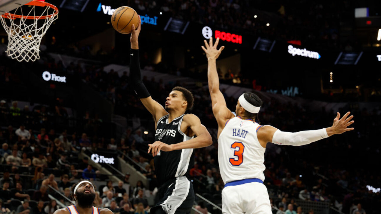 How to watch NBA Cup 2025 online, livestream San Antonio Spurs vs. New York Knicks (Victor Wembanyama of the San Antonio Spurs drives past Josh Hart of the New York Knicks)