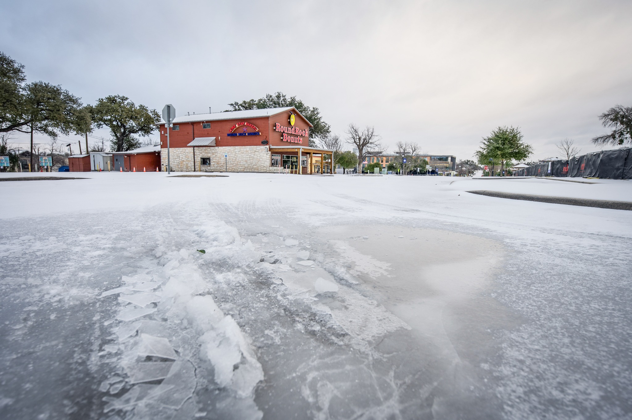 Slick roads, sleet force closures at Austin-area businesses
