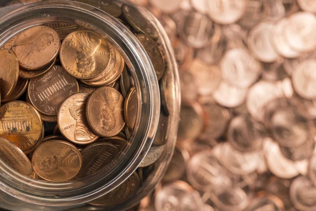 A glass jar full of pennies_ Image by John Brueske via Shutterstock_