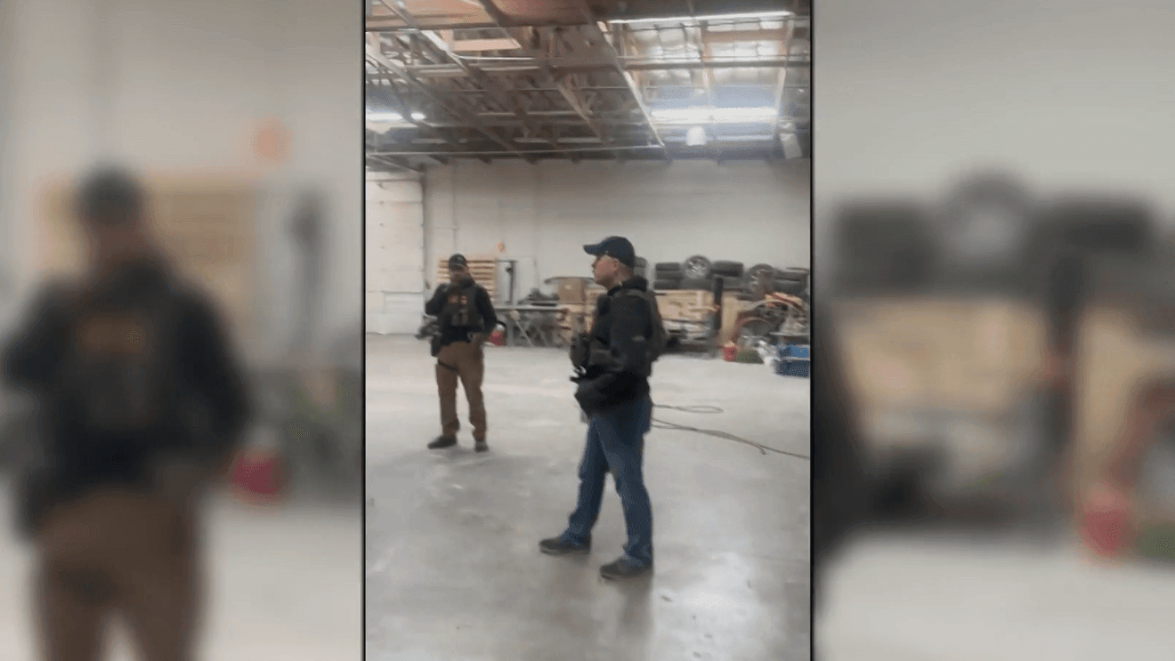 Video shows business door shattered after ICE agents detain two employees