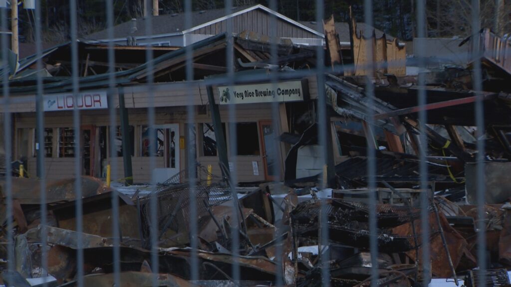 Asbestos removal stalls cleanup at burned Nederland shopping center, businesses moving elsewhere