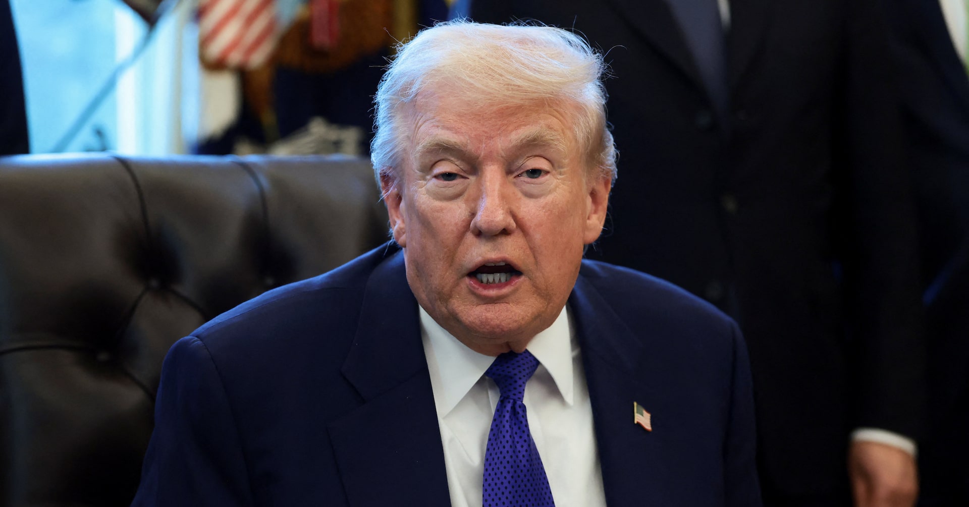 Trump signs order threatening tariffs on nations doing business with Iran