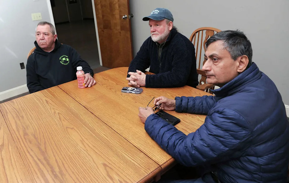 From left, Francis Bartolomeo, owner of Fran's Cans & Bart's Bottles, Fred Miers, owner of Simple Bottle Return, and P.C. Patel, owner of Empty Bottle Return, talk about the new Connecticut bottle law at Simple Bottle Return in Bridgeport on March 6, 2026. (Arnold Gold/Hearst Connecticut Media)