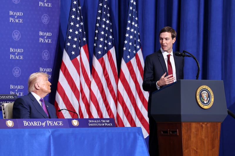 President Donald Trump listens as his son-in-law, Jared Kushner, speaks during the inaugural Board of Peace meeting at the U.S. Institute of Peace in Washington, D.C., U.S., February 19, 2026.