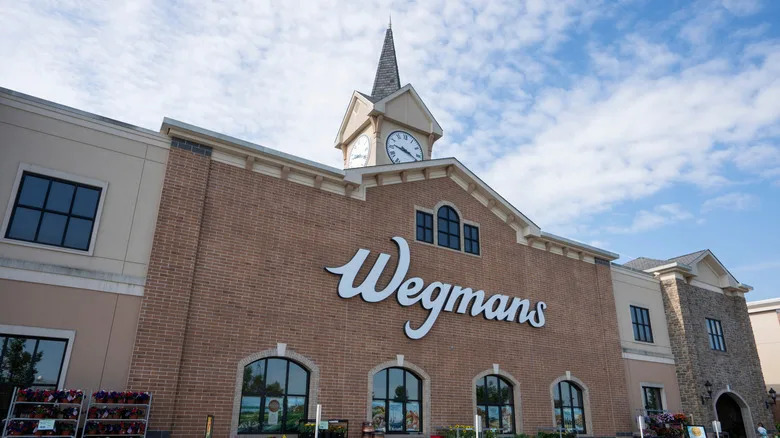 Brick facade of a Wegmans store topped with a clock tower