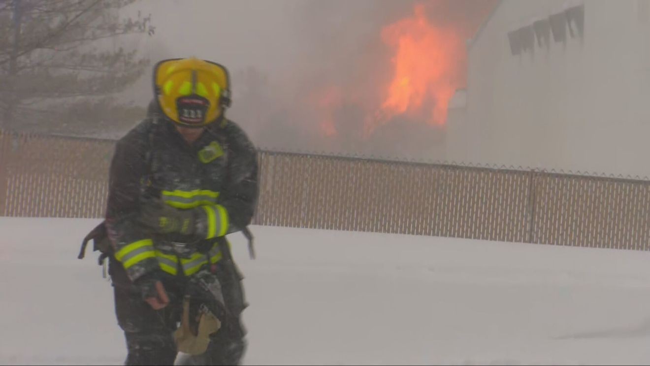 Blizzard Elsa hampers efforts to control business fire in Green Bay