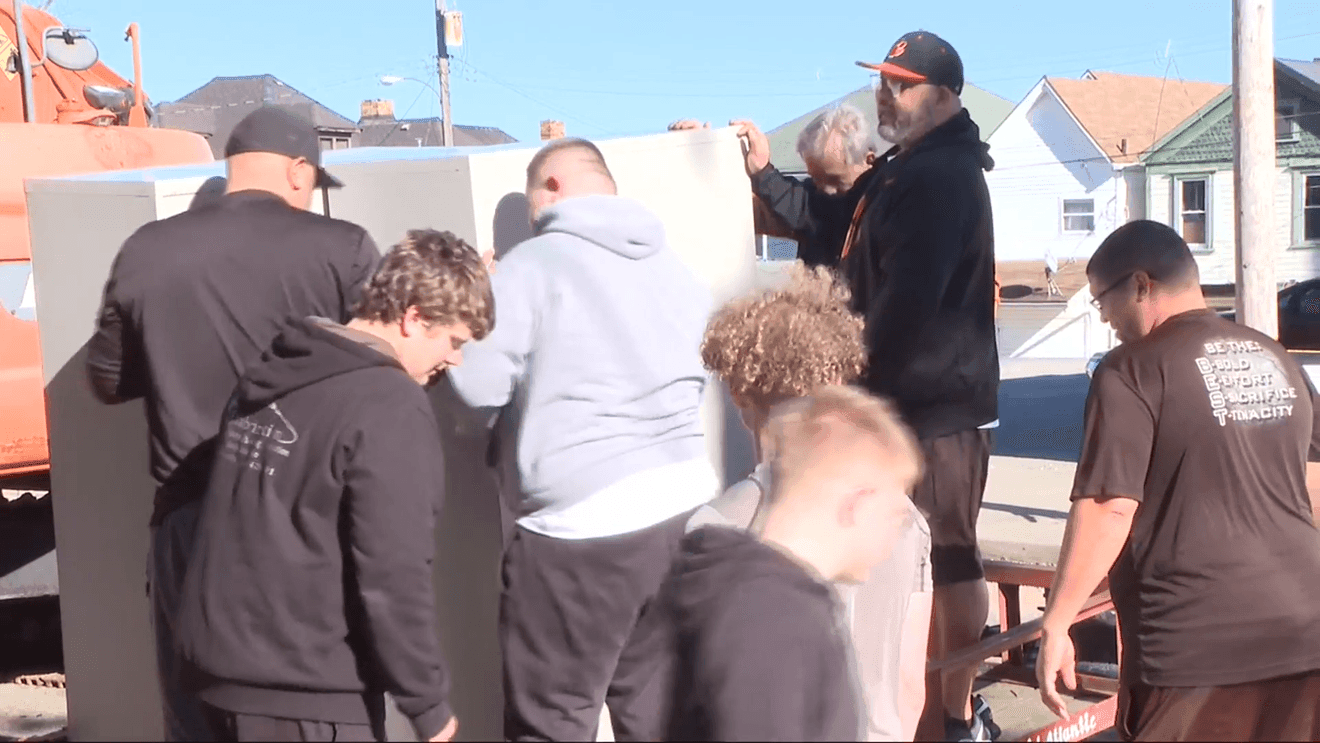 Community chips in to help business damaged by building collapse