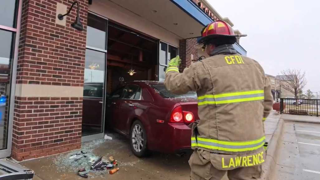 Vehicle crashes into Gardner business, one injured