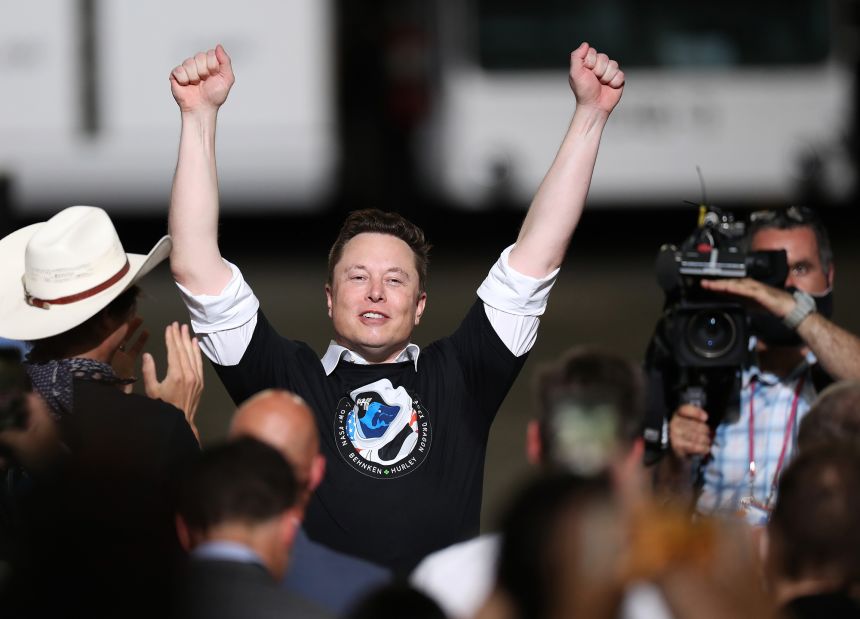 Spacex founder Elon Musk celebrates after the successful launch of the SpaceX Falcon 9 rocket with the manned Crew Dragon spacecraft at the Kennedy Space Center on May 30, 2020 in Cape Canaveral, Florida.