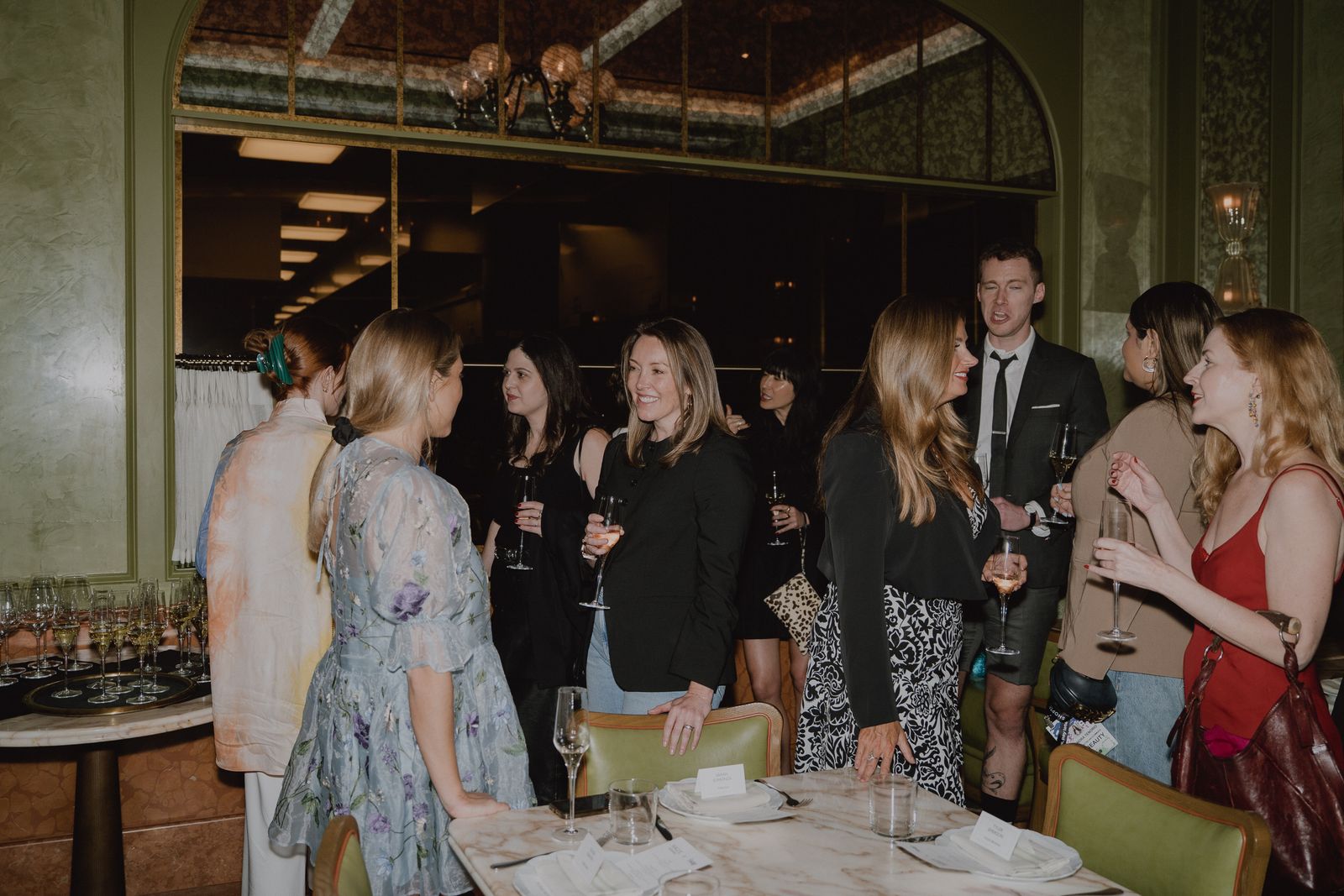 Image may contain Robert Doherty Naoko Watanabe Adult Person Fun Party Child Wedding Cutlery Fork and Chair