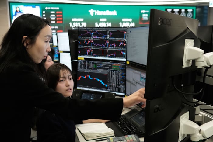 Asian shares mostly gain while oil prices keep rising